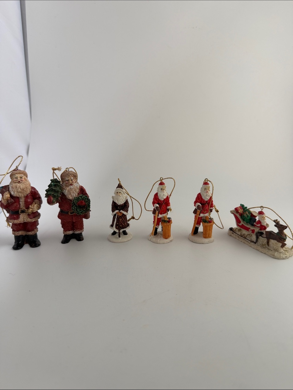 Vintage Miniature Santa Claus’s Set of 6